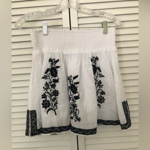 JCREW White cotton mini with black floral embroidery accents.